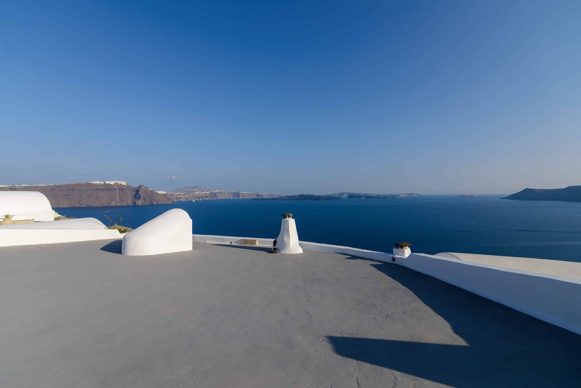 Roof of hotels on the background of the Mediterranean Sea on the island of Santorini, Oia village.