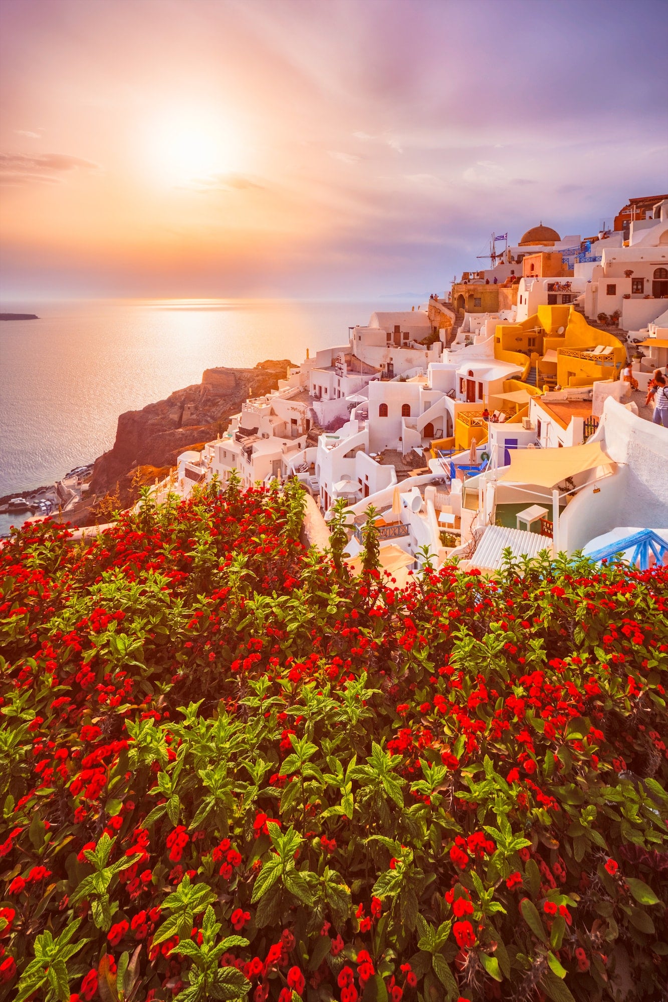 Sunset over Oia town on Santorini island in summer. Santorini, Greece