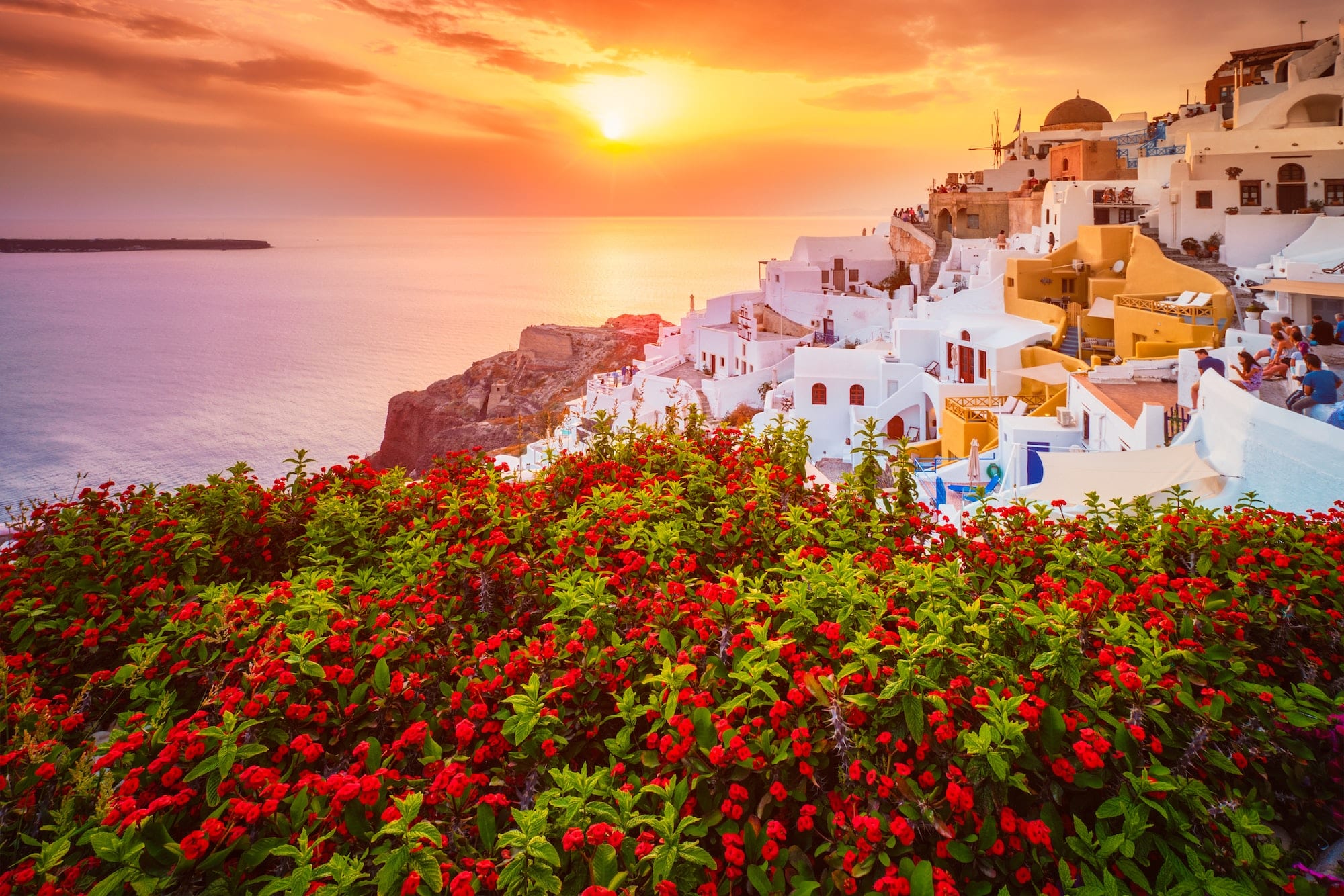 Sunset over Oia town on Santorini island in summer. Santorini, Greece