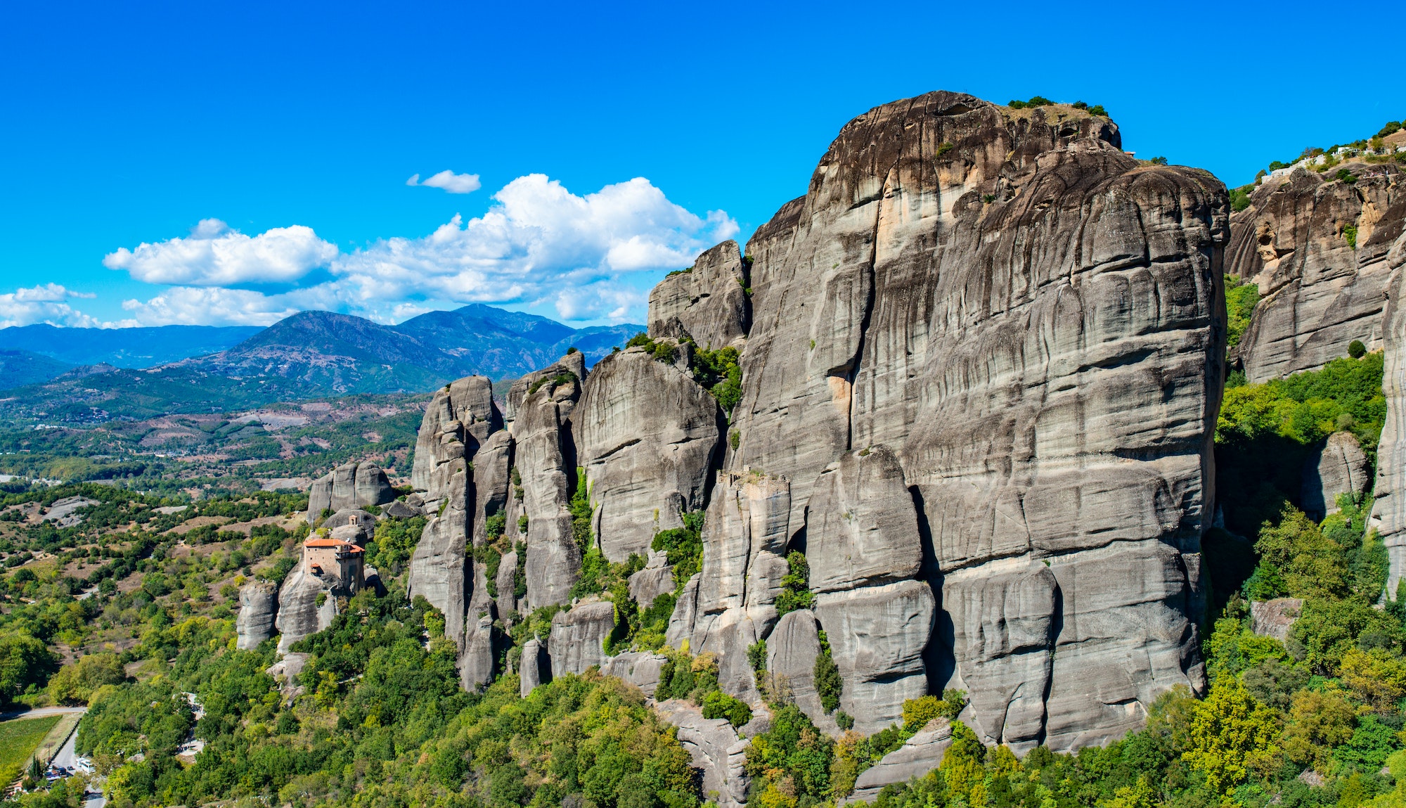 Meteora monastery on Corfu mountains with greenery