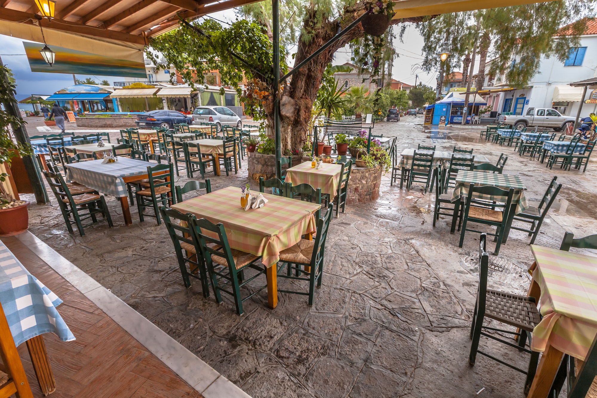 Traditional Village Restaurant terrace around big tree
