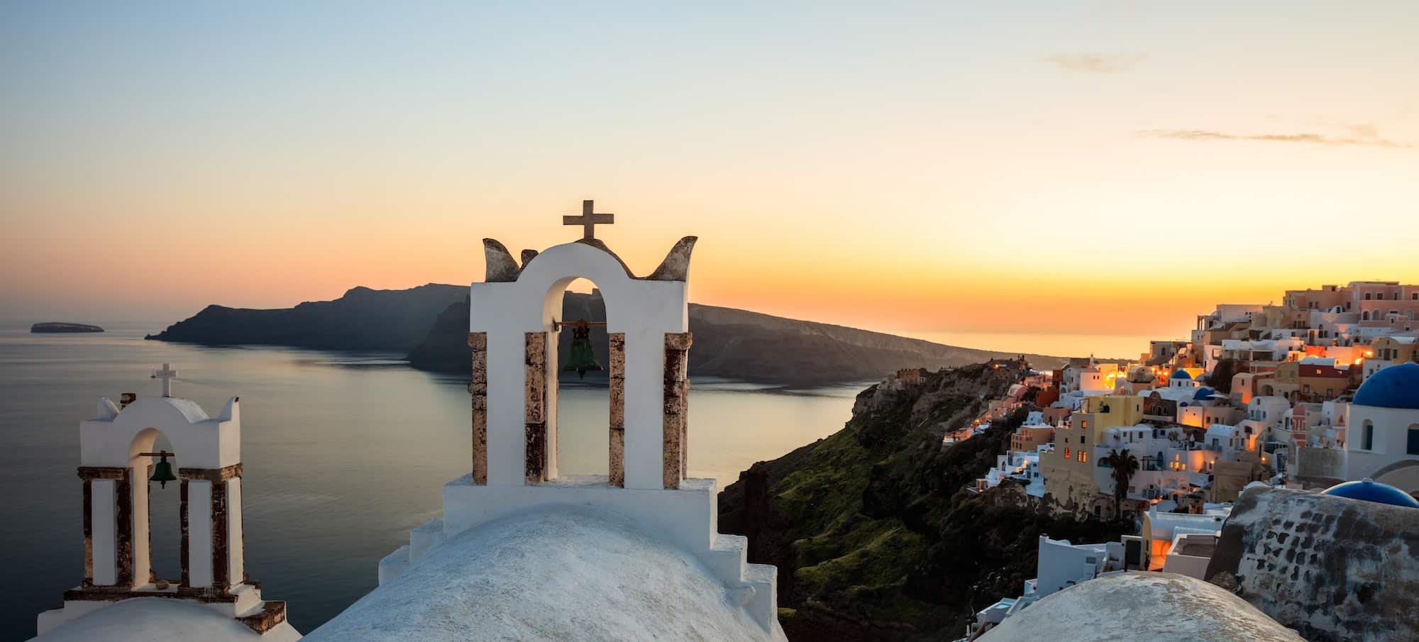 Sunset over Aegean sea at Santorini island Greece