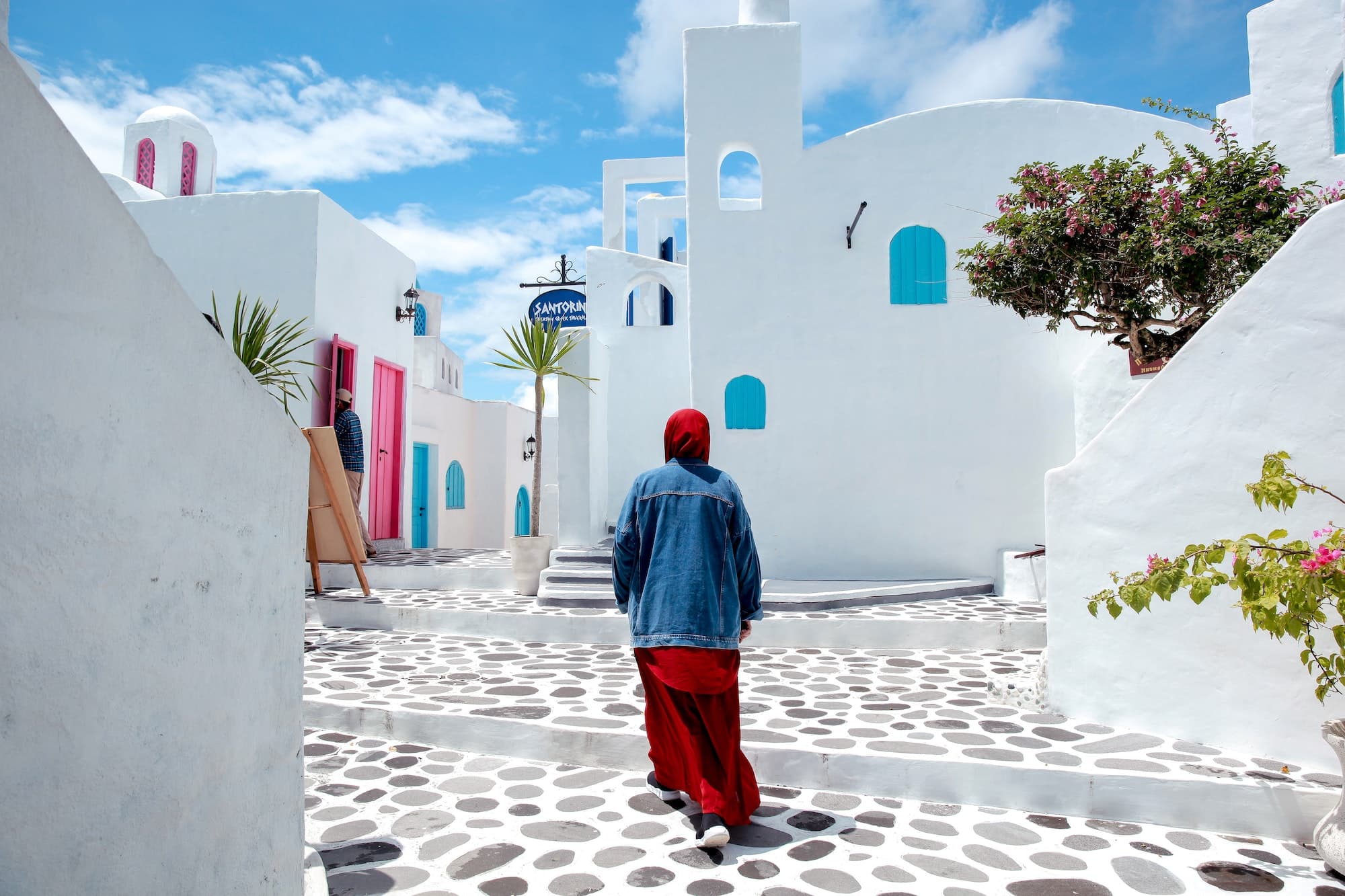 Woman walking forward at Santorini