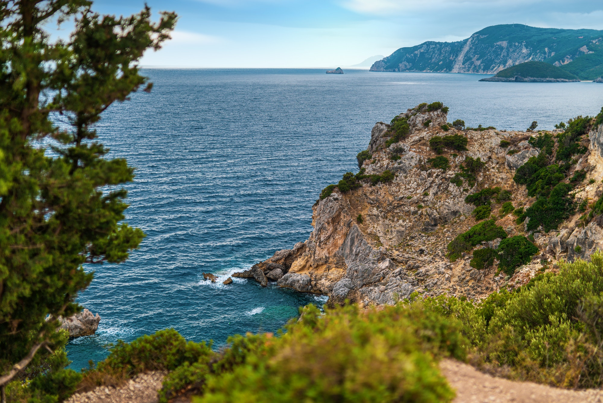 Mountains and forestry hills surround resort on Corfu island