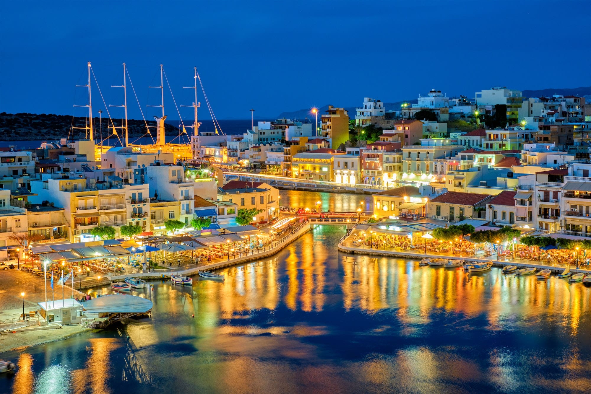Beautiful Agios Nikolaos town at night. Lasithi region of Crete island, Greece