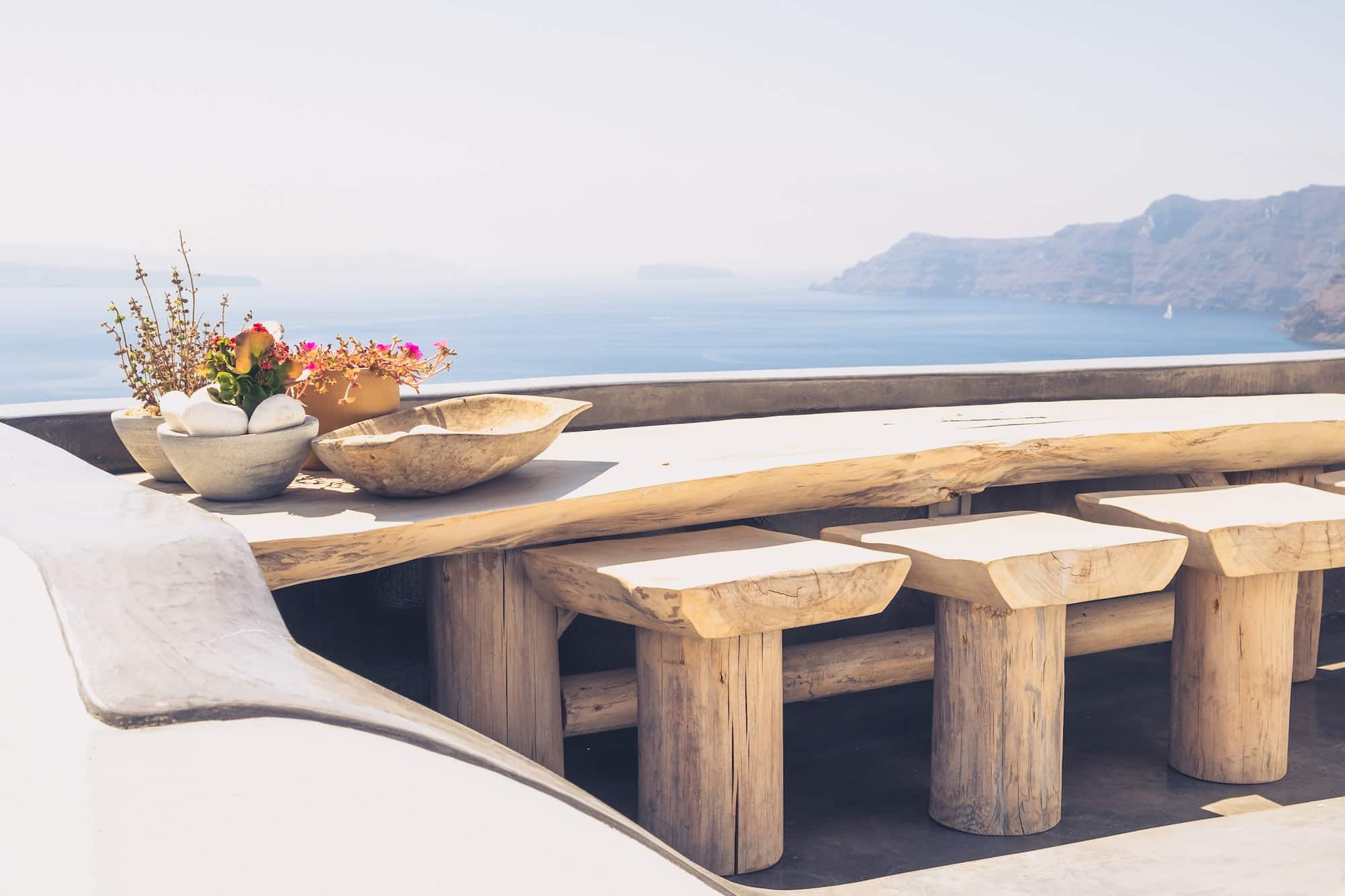 Beautiful vintage wooden table and chairs on terrace, Santorini