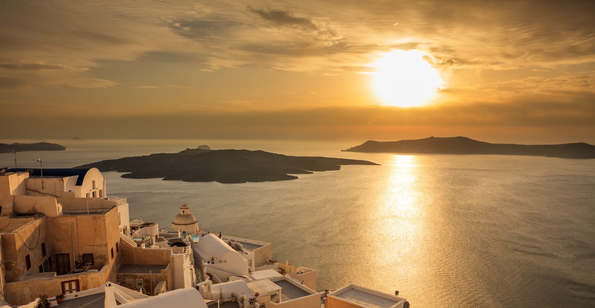 Santorini island, Greece - Sunset over Aegean sea