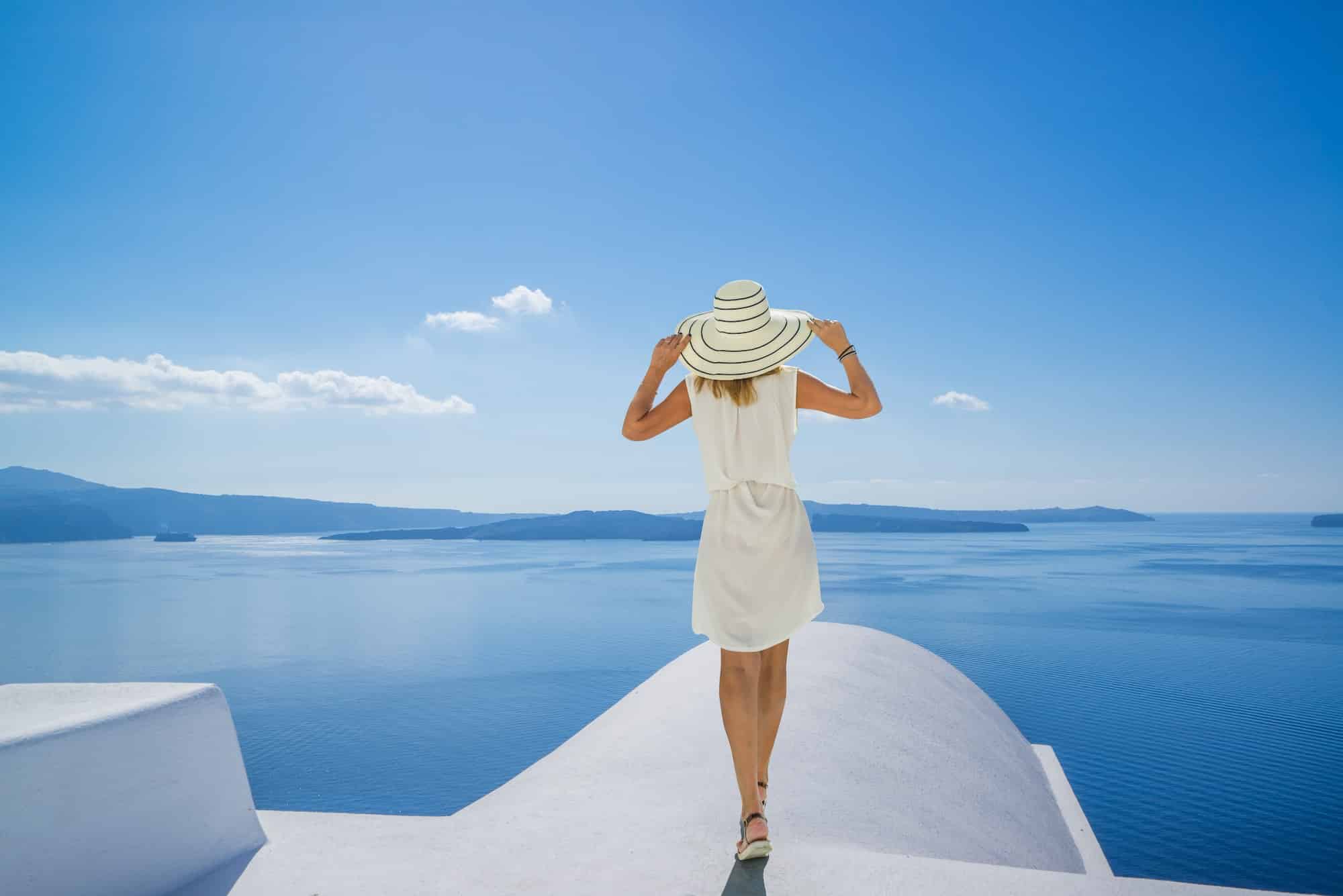 Young woman on holidays, Santorini Oia town