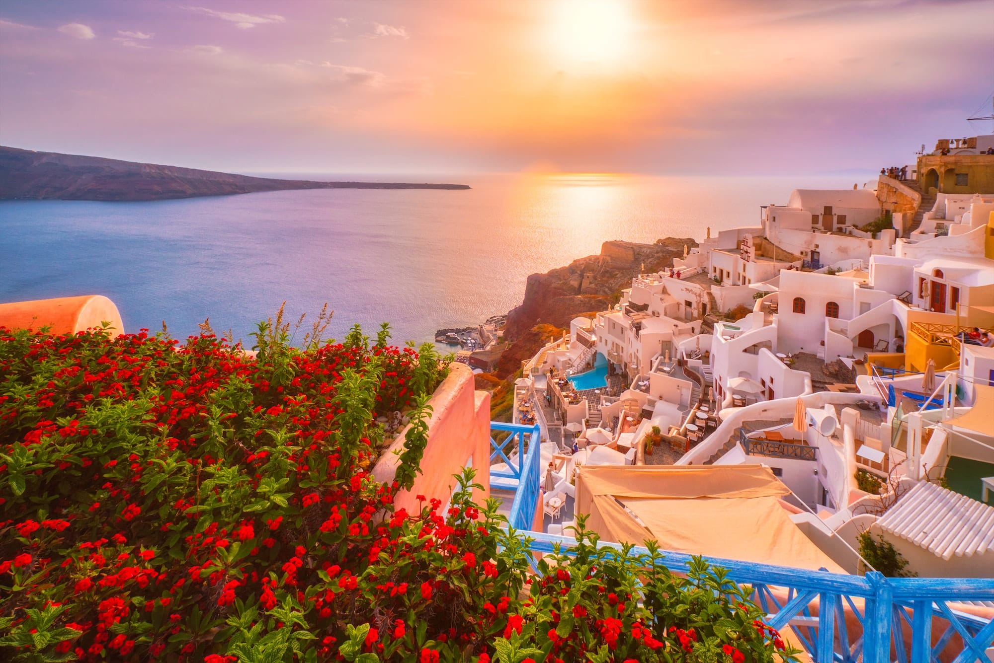 Sunset over Oia town on Santorini island in summer. Santorini, Greece