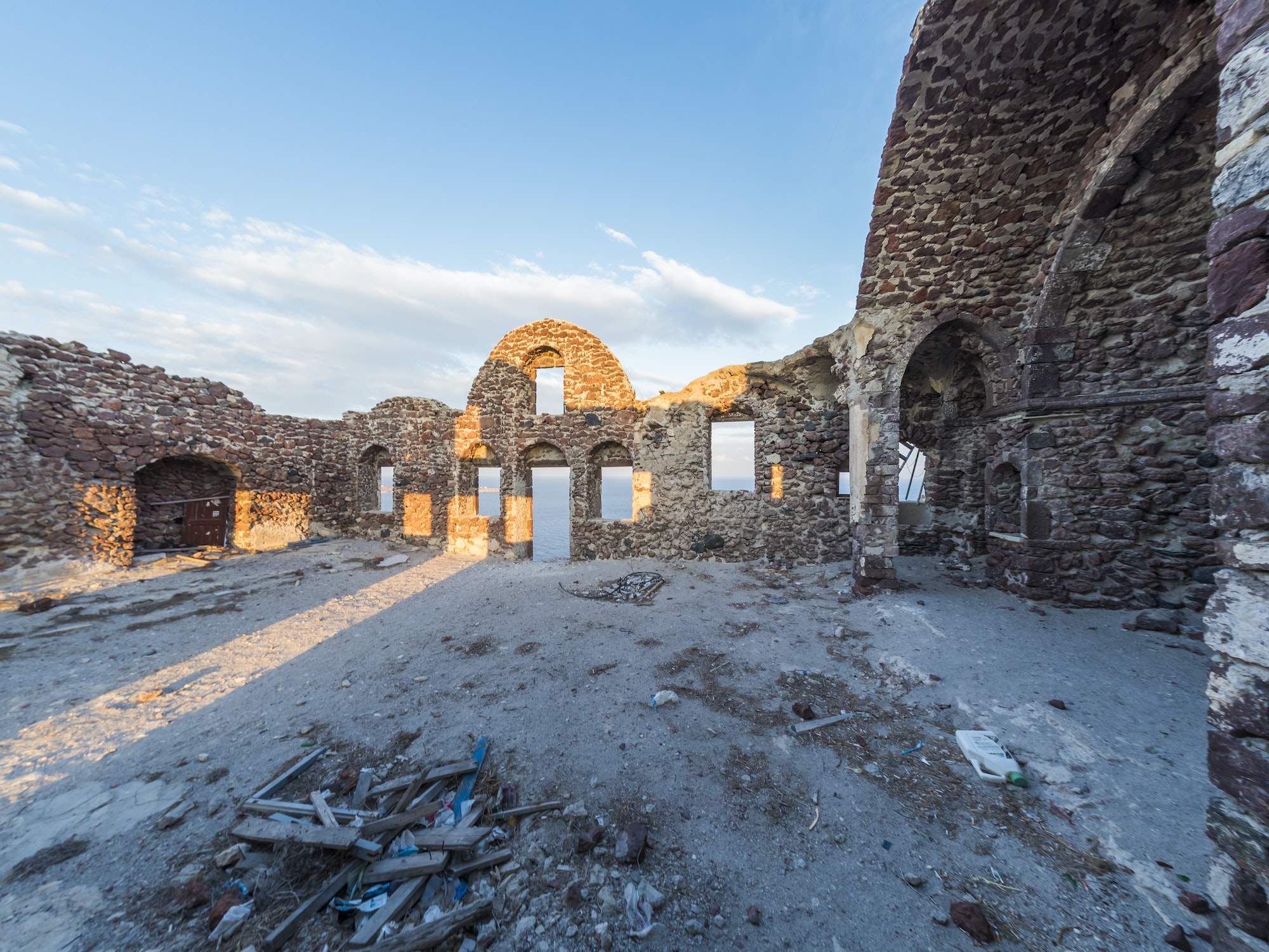 View of Venetian castle in Oia village on Santorini island.