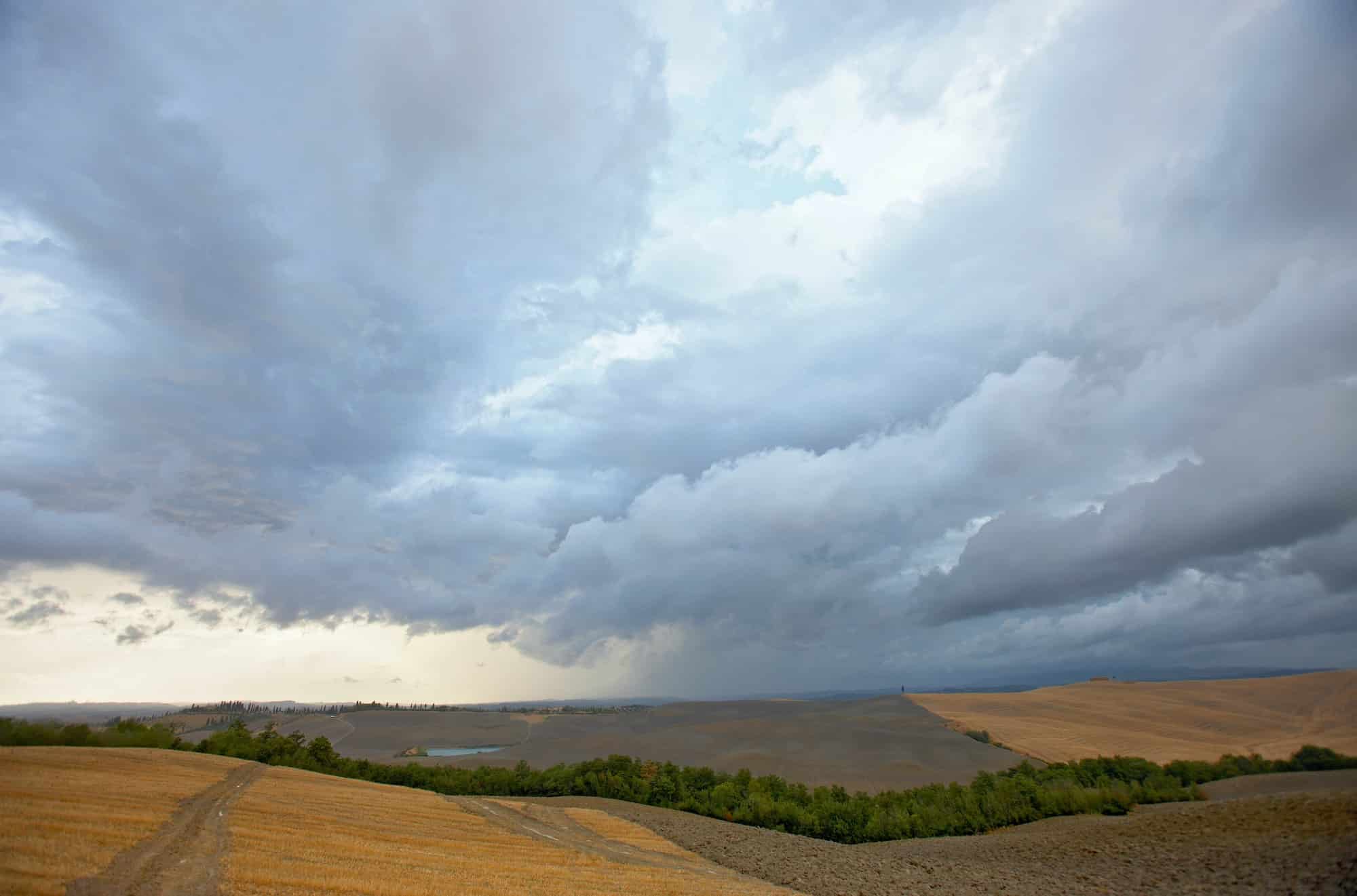 Crete senesi during a thunderstorm