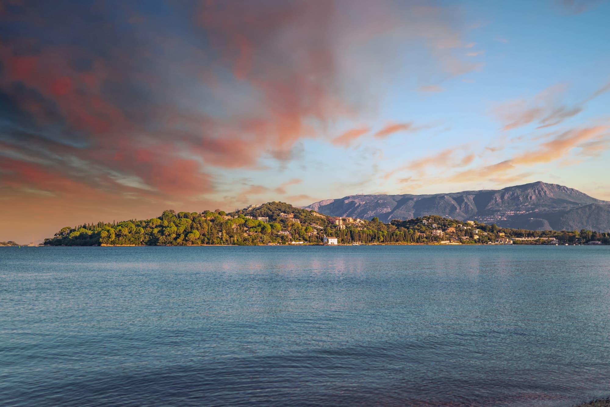 Landscape of Corfu island with buildings and mountains