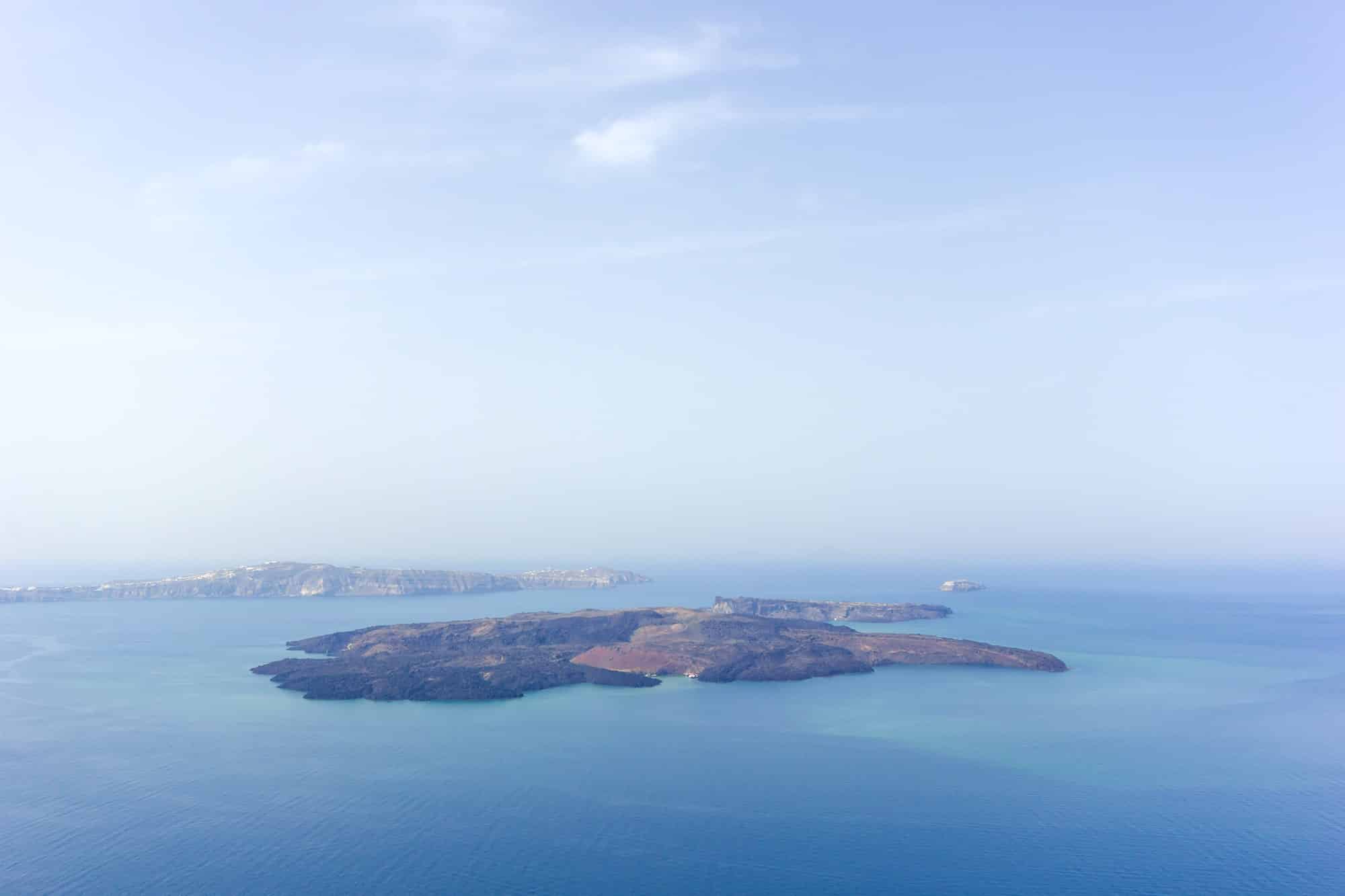 Santorini island and the volcanic isle