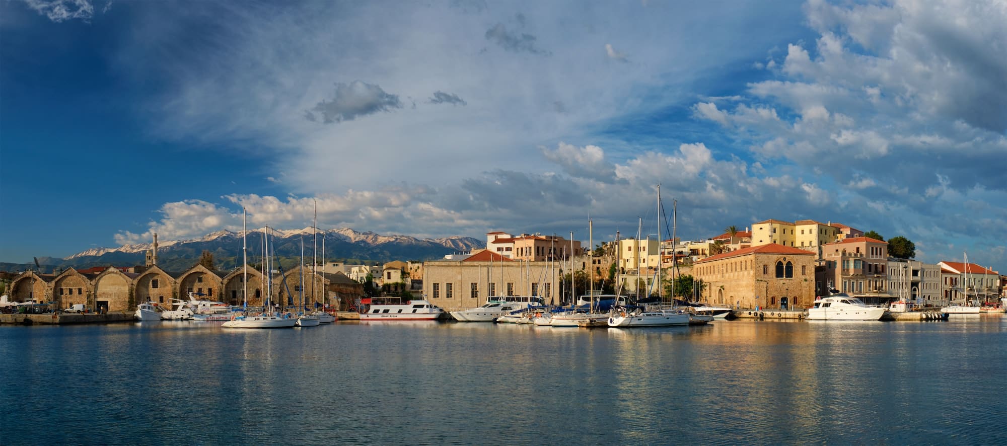 Yachts and boats in picturesque old port of Chania, Crete island. Greece