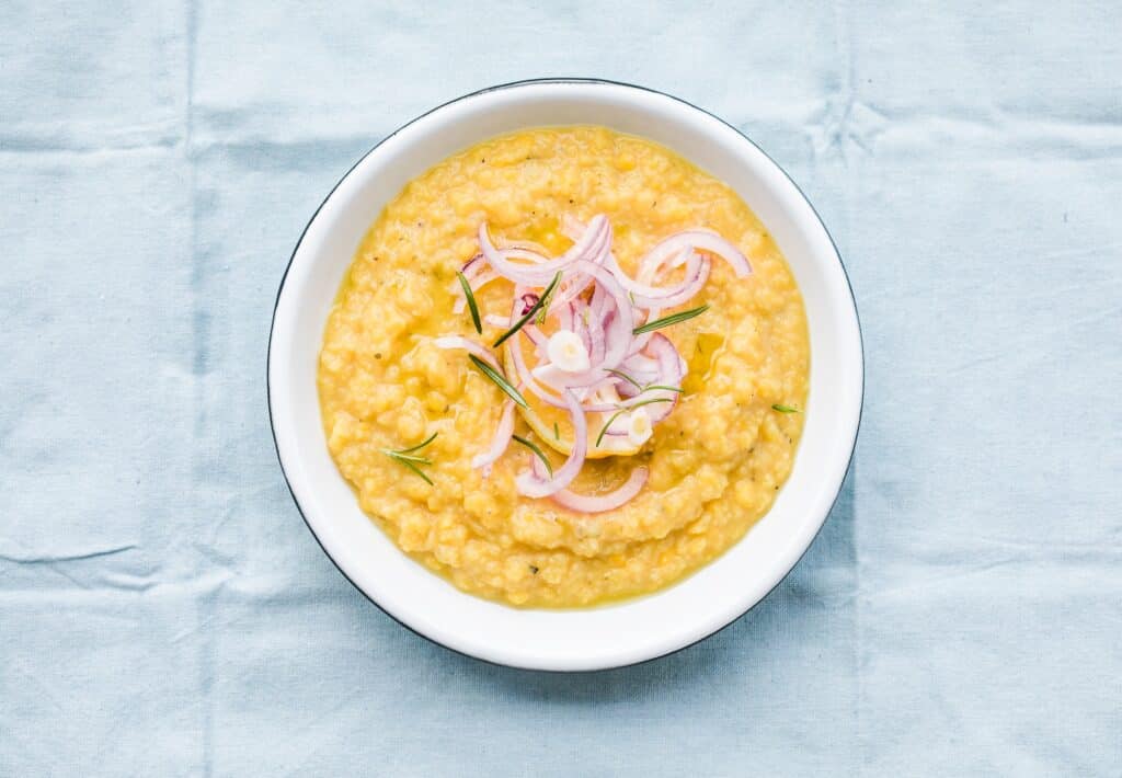 Yellow split peas dip with olive oil and green onions. Fava greek food