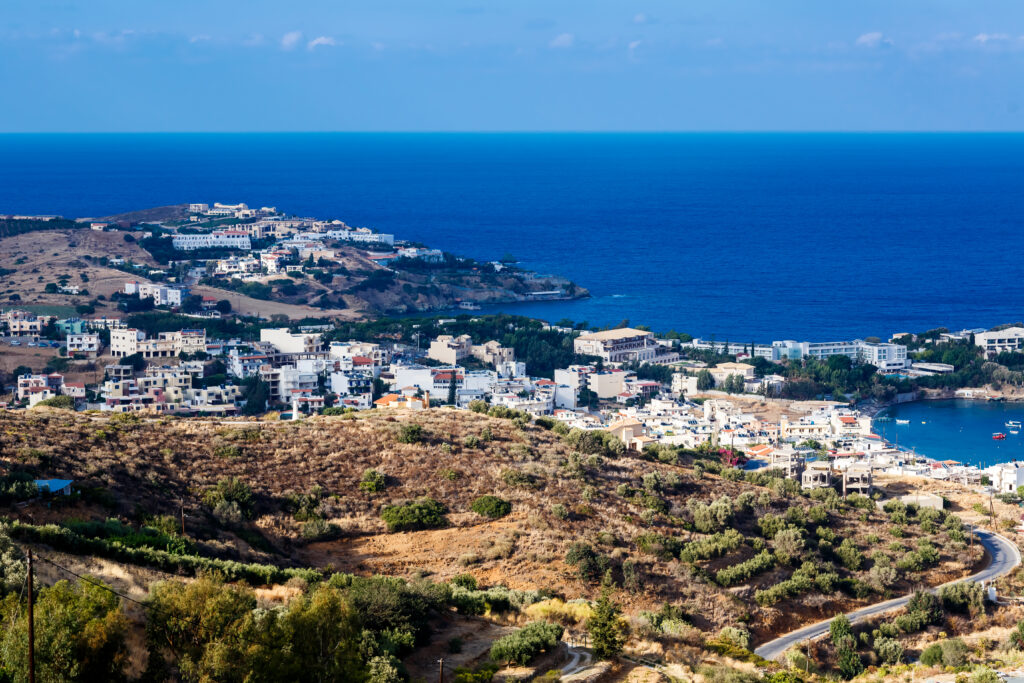 The top view on the sea and the city of Agia Pelagia in Crete, G