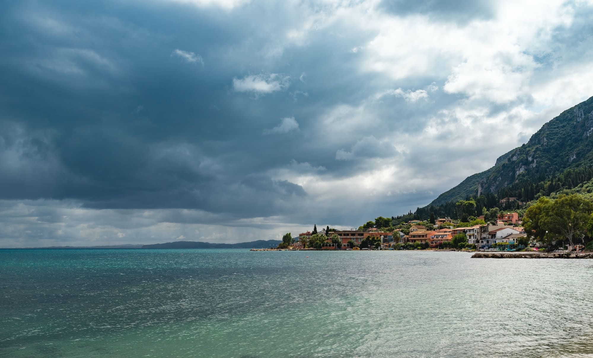 Bay with crystal clear water in Paleokastritsa on Corfu island
