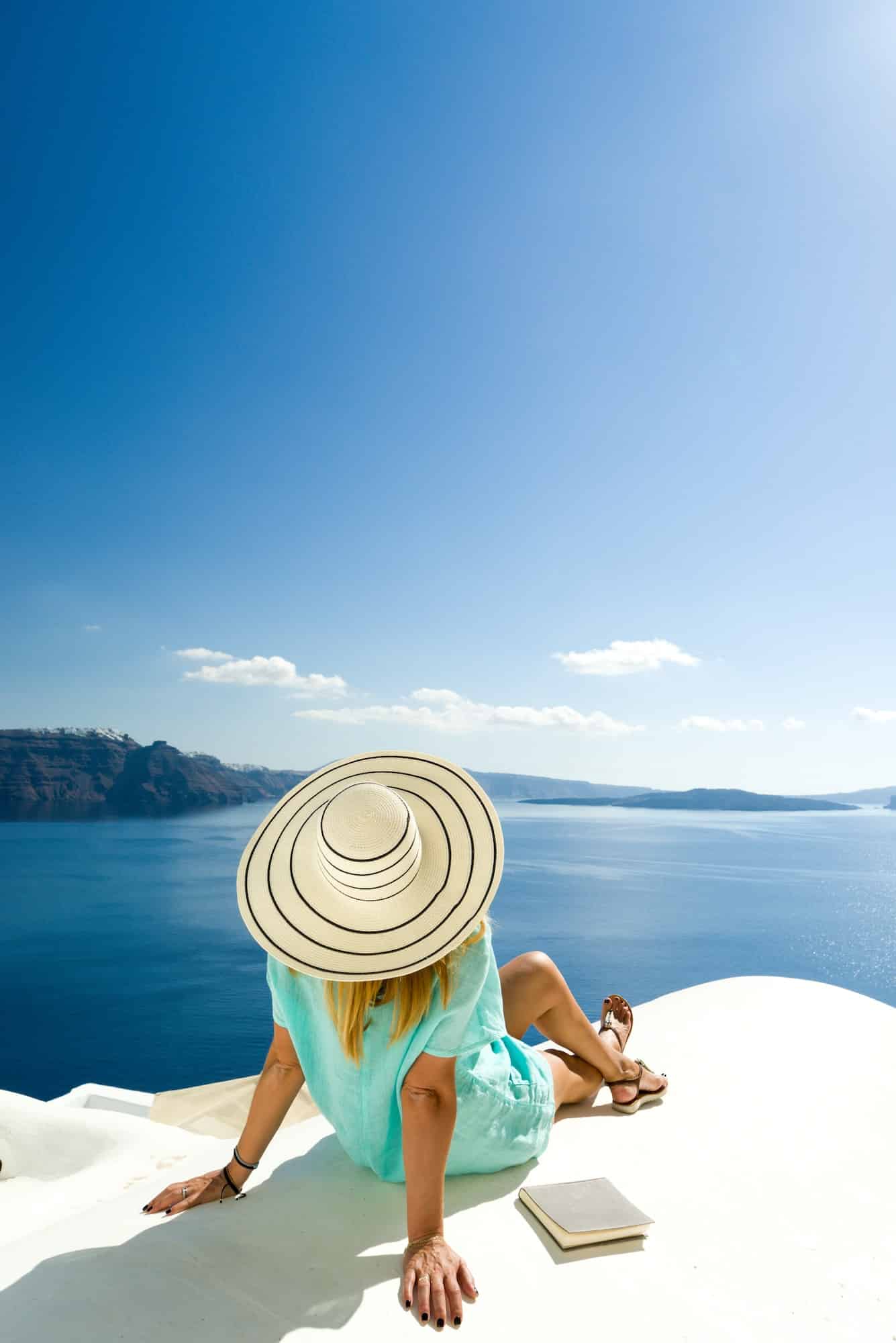 Woman on holidays in Santorini Greece