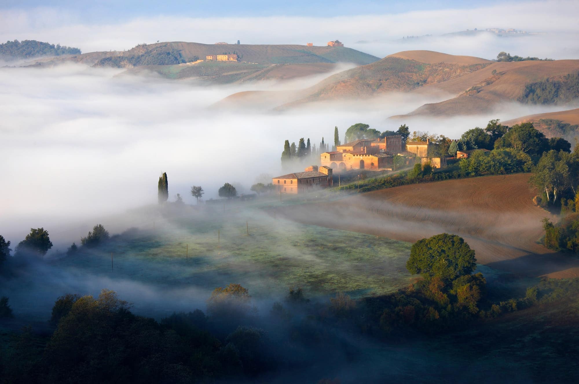 Crete senesi with fog early morning